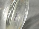 a glass jar with a lid sitting on a table