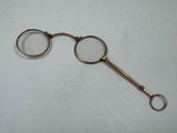 an image of a pair of glasses on a white surface