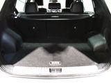 a trunk of a car with the back seats folded down