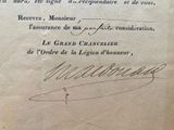 an old book with a handwritten title and a picture of a man