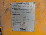 a sign on the side of a machine that says specification plate