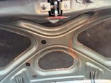 a close up of a car ' s front bumper with a hole in it