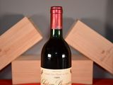a bottle of wine that is sitting on a table