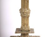 a gold candle holder on a white background