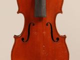 an old violin with a bow on a white background