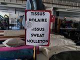 a sign that says tiss polare, tiss sweat, molletton and tiss