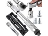 a hand holding a wrenet and a wrenet with other tools