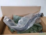 a box with a bunch of green items inside of it