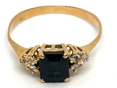 Bague en or jaune 18K 750 ml, ornée au centre d'un saphir d'Australie  - Photo 1