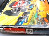 a box that has a picture of a racing car on it