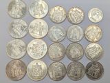 a close up of a bunch of coins on a table