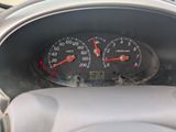 a close up of a speedometer in a car