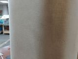 a close up of the back of a chair in a room