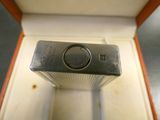 a ring that is sitting in a box on the floor