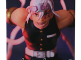 anime figurine figure of a man with pink hair and glasses