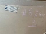a sign on the side of a refrigerator that says agresse 2