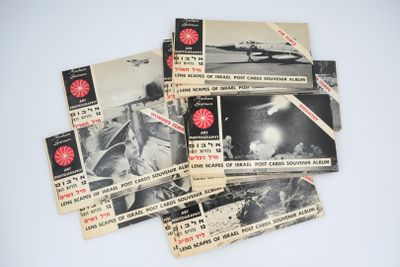 a lot of old military pamphlets on the table
