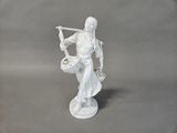 figurine of a woman with a basket of flowers in her hand