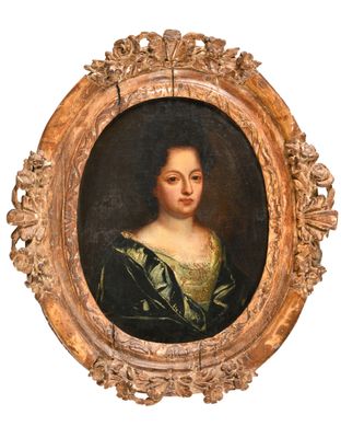 portrait of a woman in a green dress in a gold frame