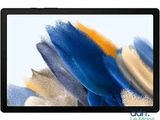 Ordinateur portable Microsoft Surface dont l'écran est recouvert de peinture bleue, jaune et blanche