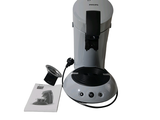 a coffee maker that is sitting on a table