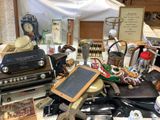 a table with a lot of old items on it