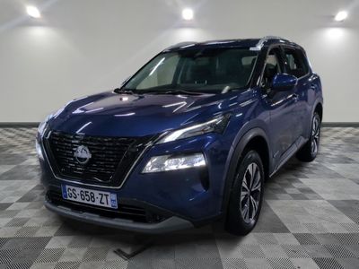 a blue nissan suv parked in a large room with a checkered floor