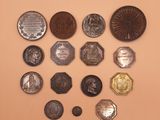 a lot of coins that are on the wall