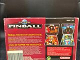 the back of a box of pinball on a black surface