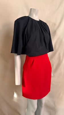 a red and black dress on a mannequin mannequin mannequin mannequin mannequin mannequin mannequin mannequin mann