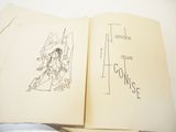 an open book with a drawing of a woman on it