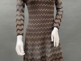a mannequin wearing a brown and black dress on a mannequin mannequin