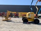 a crane that is sitting in the middle of a parking lot
