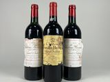 trois bouteilles de vin sont alignées sur une table