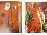 an open book with a picture of a woman in a red dress and a picture of a woman in a red dress