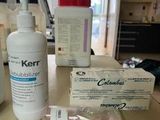 a bottle of kerm sitting on a counter next to a package of soap