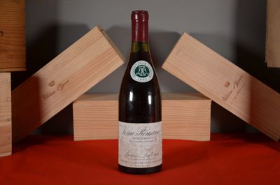 a bottle of wine that is sitting on a table
