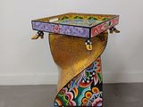 a small table with a box on top of it