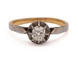 a close up of a diamond ring on a white background