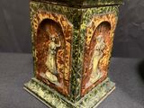 an image of a green and brown vase with figures on it
