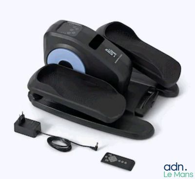 a pair of shoes that are sitting on a machine