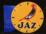 a clock with a bird on it and the word jazz written on it
