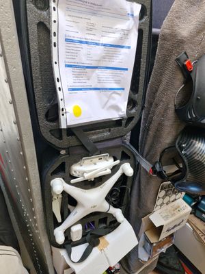 a box with a helmet and other items inside of it