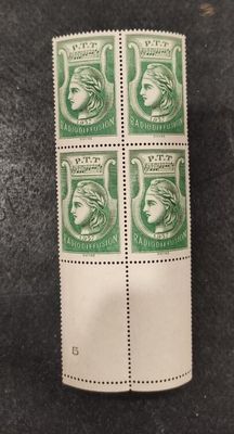 a pair of stamps with a woman ' s face on them
