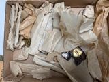 a cardboard box with a bunch of items inside of it