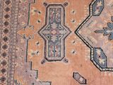 an image of a rug with a design on the middle of it