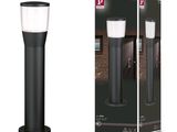 une lampe noire qui se trouve à côté d'une boîte