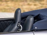 a close up of a car ' s interior with the seat up