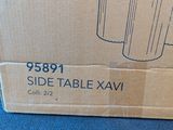 a cardboard box that is sitting on the floor