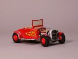 a red toy car with flames on the side of it